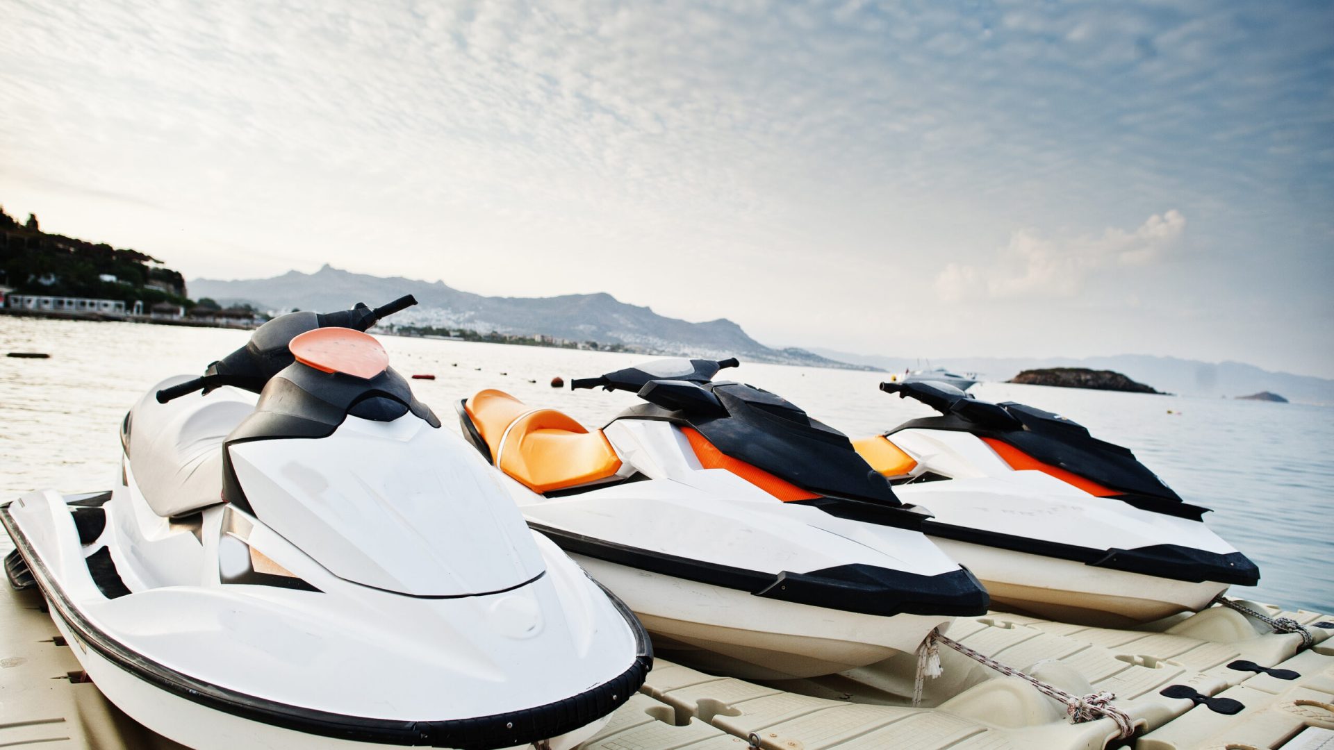 Three jet ski on a calm blue sea of Bodrum, Turkey.